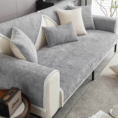 Elegant waterproof chenille sofa cover in soft hues, offering antimicrobial protection and sleek design for home decor.