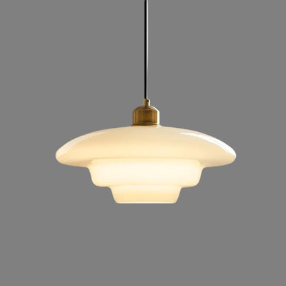Elegant white glass pendant light with brass fixture, mid-century design, perfect for modern or classic interiors, adds luxur
