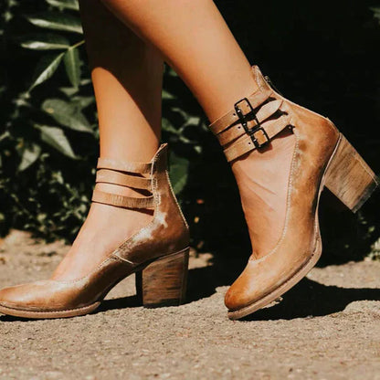 "Elegant women's block heel ankle boots in black, with round toe and back zipper, perfect for chic and comfortable wear."