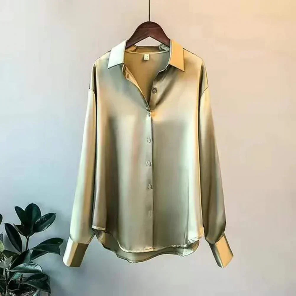 Elegant women's fall blouse in luxurious silk, soft and classic design, perfect for versatile styles and chic silhouettes.