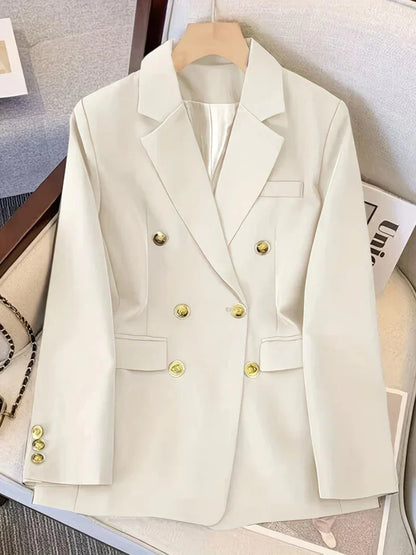 Elegant women's slim blazer with golden buttons, hip-length, long sleeves, in apricot, black, or camel, enhances style.