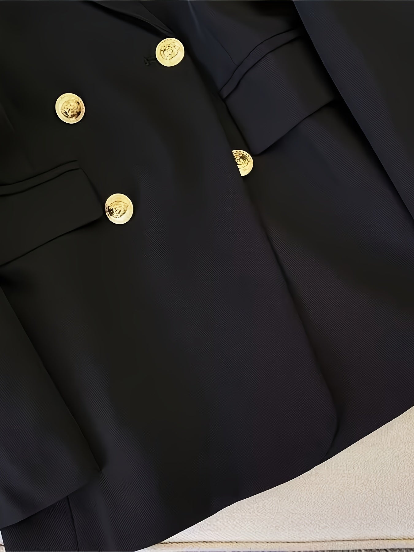 Elegant women's slim blazer with golden buttons, hip-length, long sleeves, in apricot, black, or camel, enhances style.