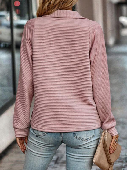 "Elegant women's V-neck jumper with chic half zip, in soft fabric for style and comfort, perfect for any occasion."