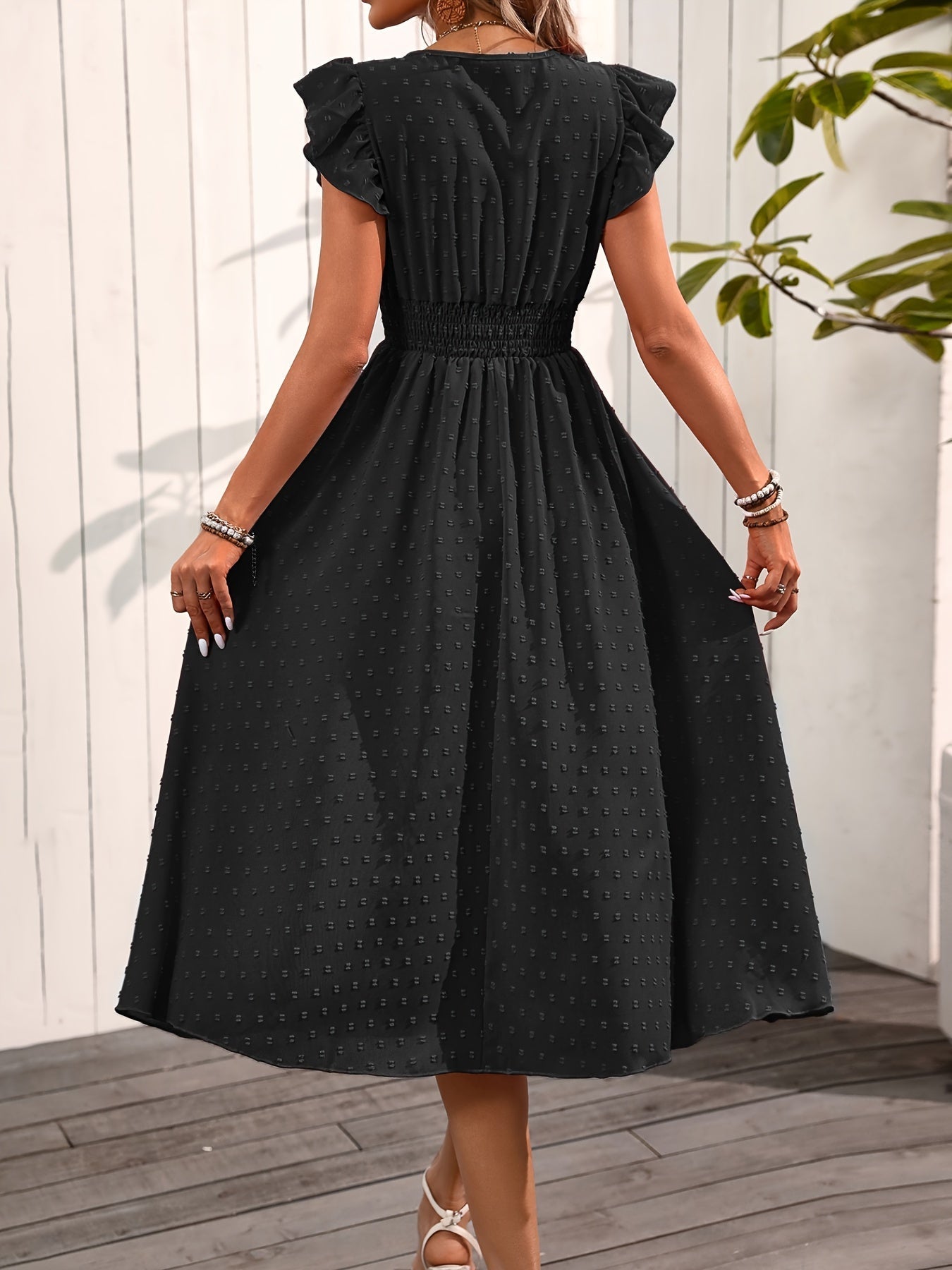 "Elegant Women's V-Neck Midi Dress with ruffle sleeves, smocked waist, dotted pattern, button-down front for casual style."