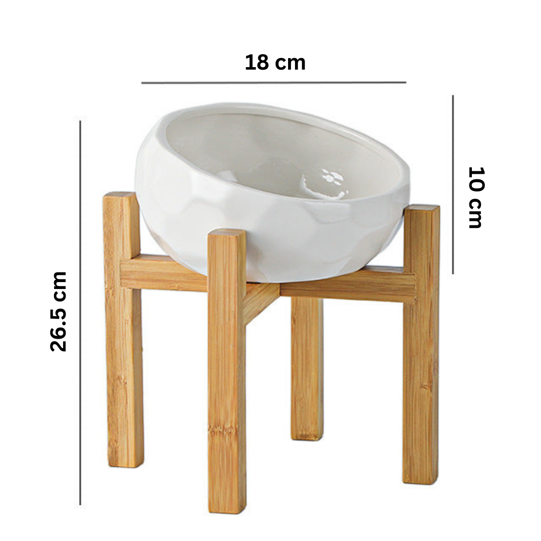 "Ergonomic elevated pet bowl with non-slip wooden stand, sleek design, blue color, enhances pet comfort and posture."