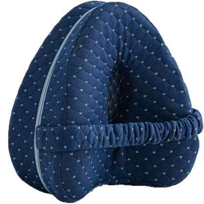 "Ergonomic grey knee pillow for side sleepers, enhancing alignment and comfort with breathable memory foam for spinal health.