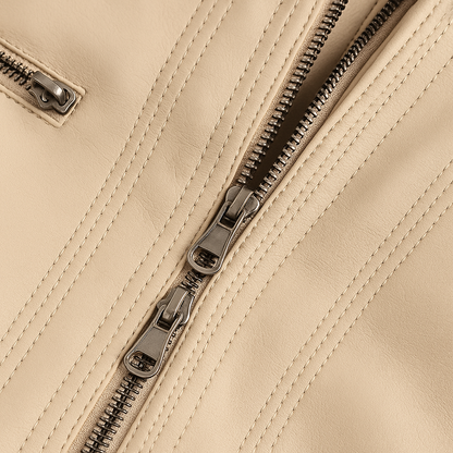 Women's faux leather jacket with removable knit hood and silver zipper, perfect for stylish everyday wear in any season