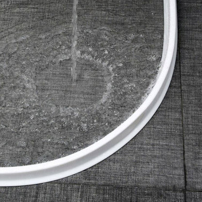 "Flexible waterproof silicone shower seal for leak prevention, shown in sleek design, ideal for bathroom water barrier."