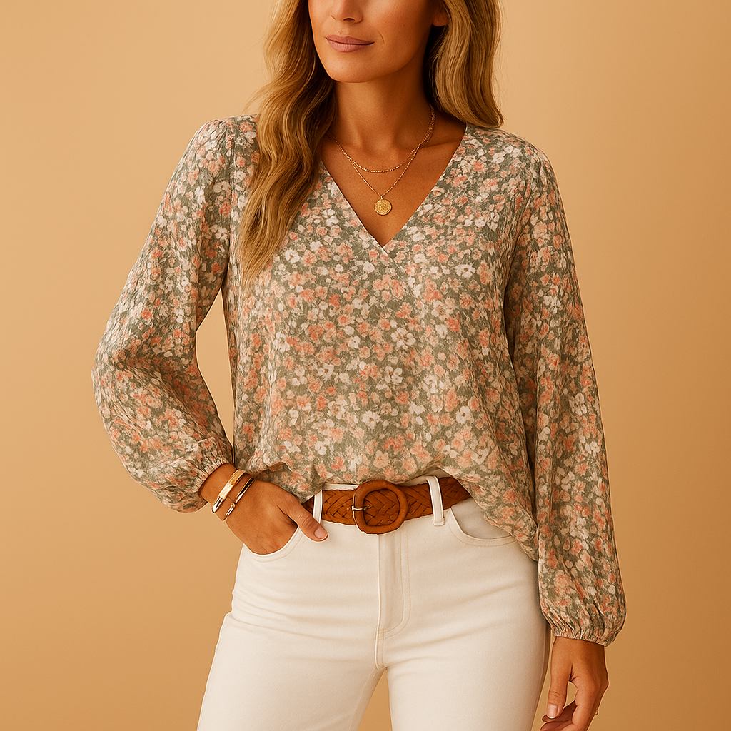 Floral summer blouse for women with long sleeves and a relaxed fit, available in pink, white, and green, perfect for sunny days or chic casual looks.