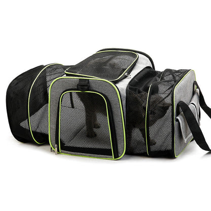 Foldable pet carrier bag with mesh inserts, soft materials, and secure zippers; ideal for comfortable and safe pet travel.