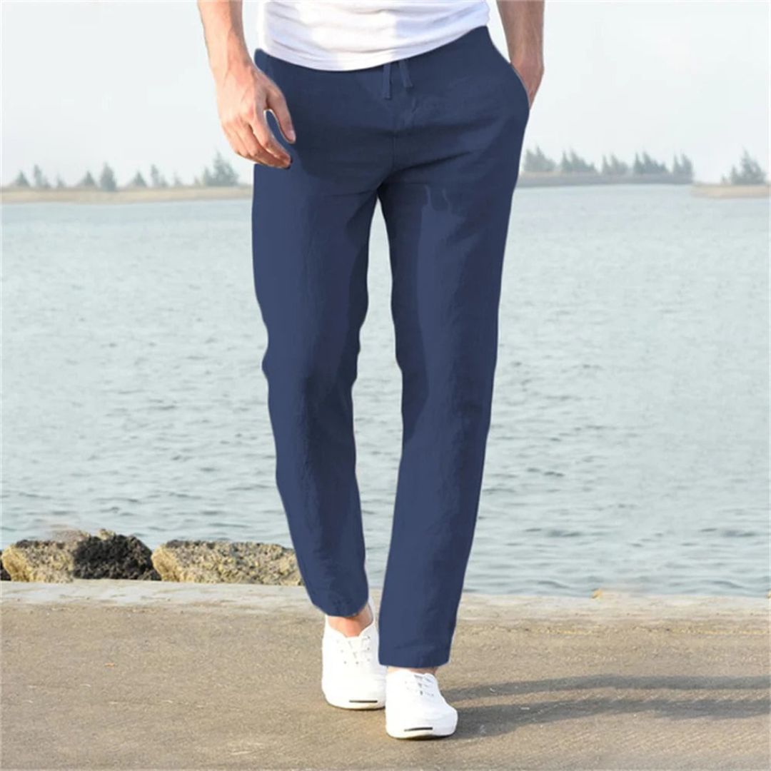 Gray lightweight linen summer pants with elastic waistband and pockets, perfect for men's casual or beach wear.