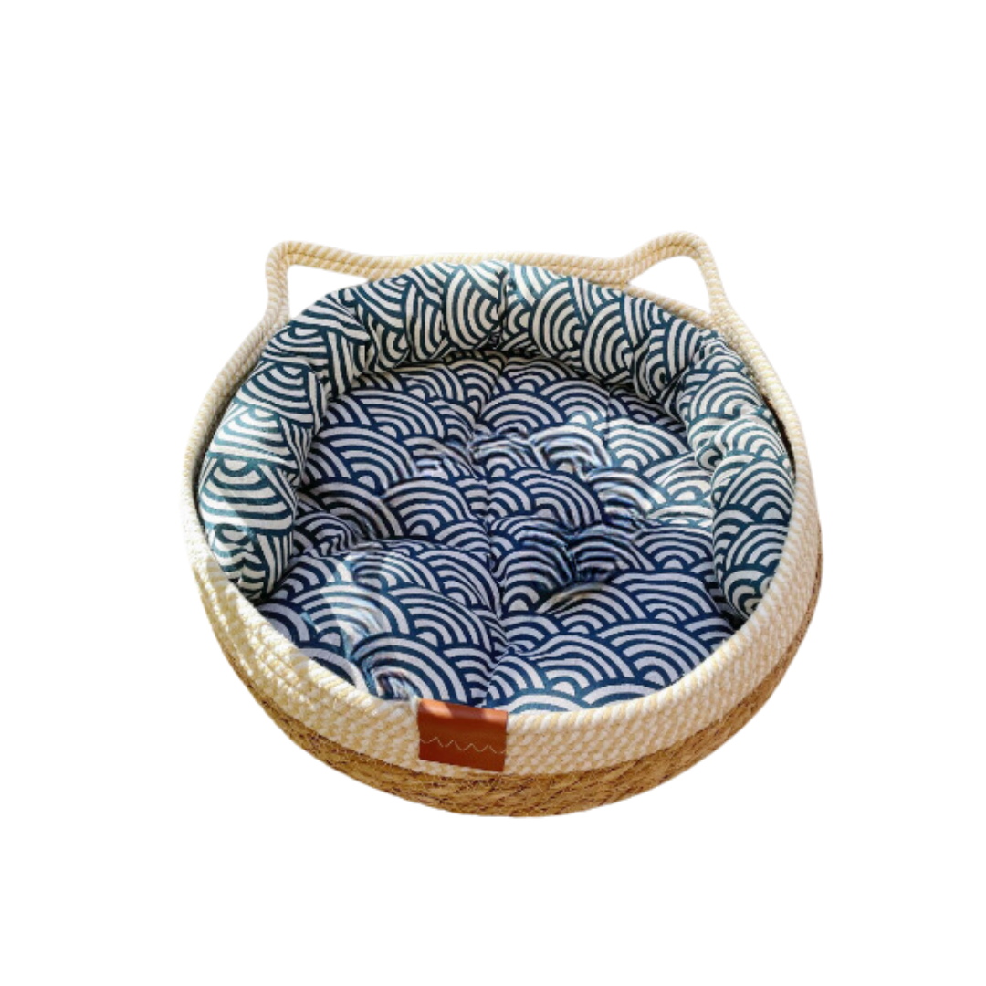 "Handcrafted sisal and cotton cat bed, white and blue tones, cozy cushion, nest design for comfort and scratching."