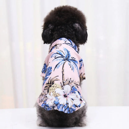 Hawaiian dog shirt with vibrant tropical patterns, featuring pineapples and foliage in bold colors for pet summer style.