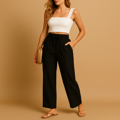 Women’s high-waisted lounge pants with a straight leg, lightweight fabric, and pockets, perfect for casual comfort at home or on the go.