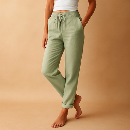 Women’s high-waisted lounge pants with a straight leg, lightweight fabric, and pockets, perfect for casual comfort at home or on the go.