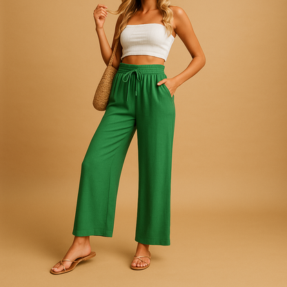 Women’s high-waisted lounge pants with a straight leg, lightweight fabric, and pockets, perfect for casual comfort at home or on the go.