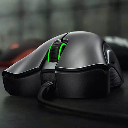 "Jet Black ergonomic optical gaming mouse with contoured design, precision 6,400 DPI sensor, and responsive buttons for gamer