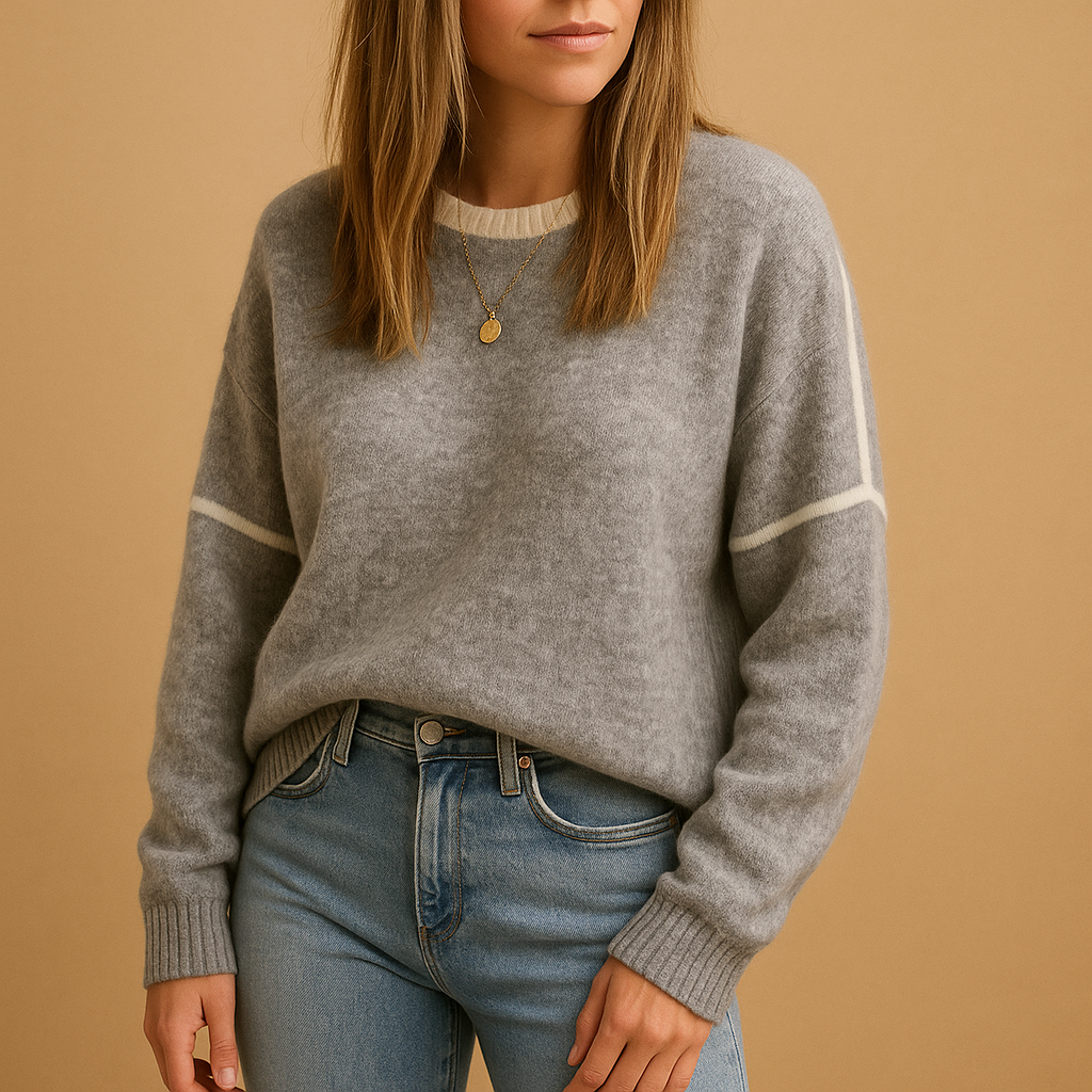 Women’s knit sweater with round neckline, long sleeves, and a wrinkle-resistant finish—perfect for stylish comfort in cool weather.