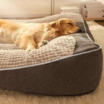 "Large orthopaedic dog bed with thick cushion, ideal for big dogs, offering spine and joint support in durable fabric."
