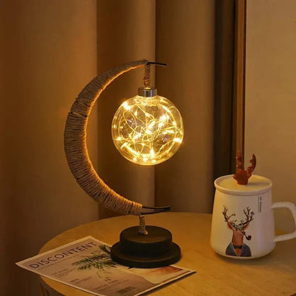 "LED Moon Star Night Light with hemp rope, moon-shaped, emits warm glow, ideal decor for cozy rooms, rustic charm."