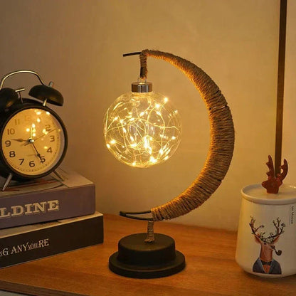 "LED Moon Star Night Light with hemp rope, moon-shaped, emits warm glow, ideal decor for cozy rooms, rustic charm."