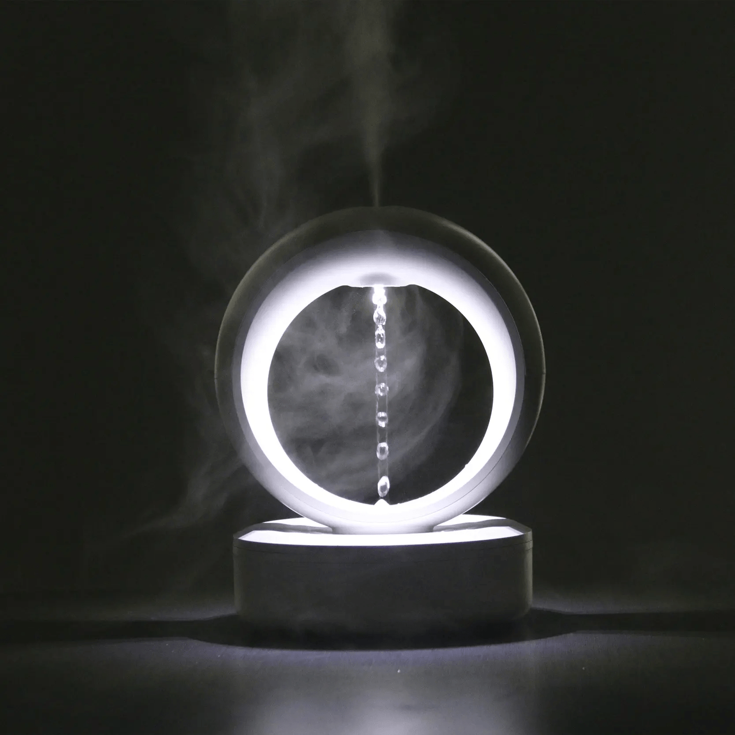 "Levitating Water Droplet Ultrasonic Humidifier with LED light, showing floating droplets effect, perfect for modern decor."