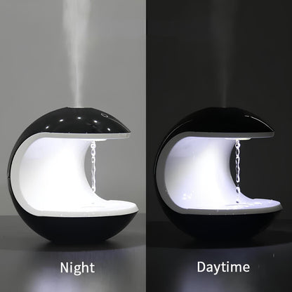 "Levitating Water Droplet Ultrasonic Humidifier with LED light, showing floating droplets effect, perfect for modern decor."