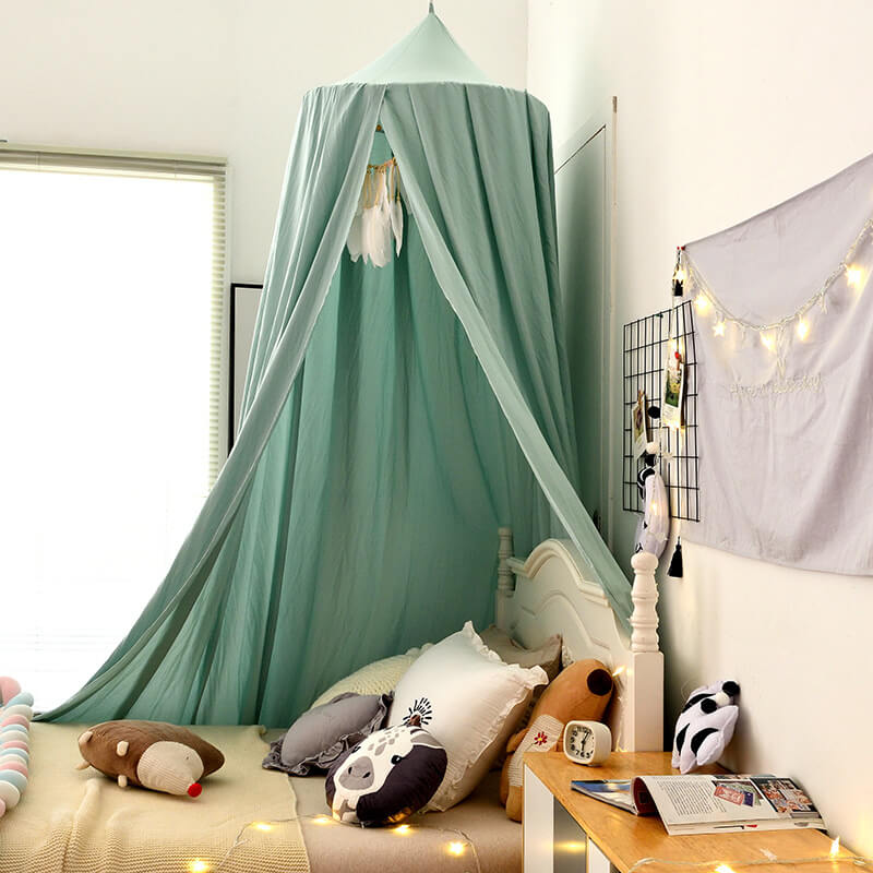 "Light green children's blackout bed canopy; elegant polyester fabric; blocks light; ideal for cribs, creating a cozy vibe."