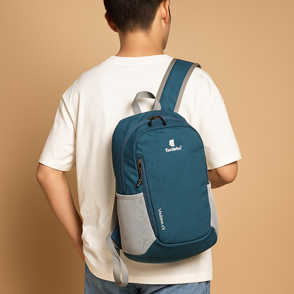Lightweight waterproof backpack for women with 20-litre capacity, ergonomic straps, and foldable design for travel, hiking, or daily adventures.