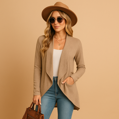 Long knitted cardigan for women in solid colors, perfect for layering in autumn and spring with a chic and cozy look.