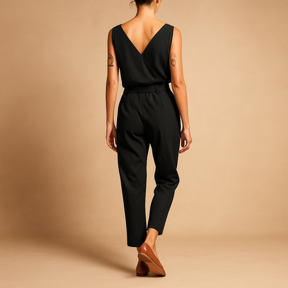 Women’s summer jumpsuit with V-neck and adjustable waistband in a loose fit, perfect for warm weather, beach days, or casual lounging.