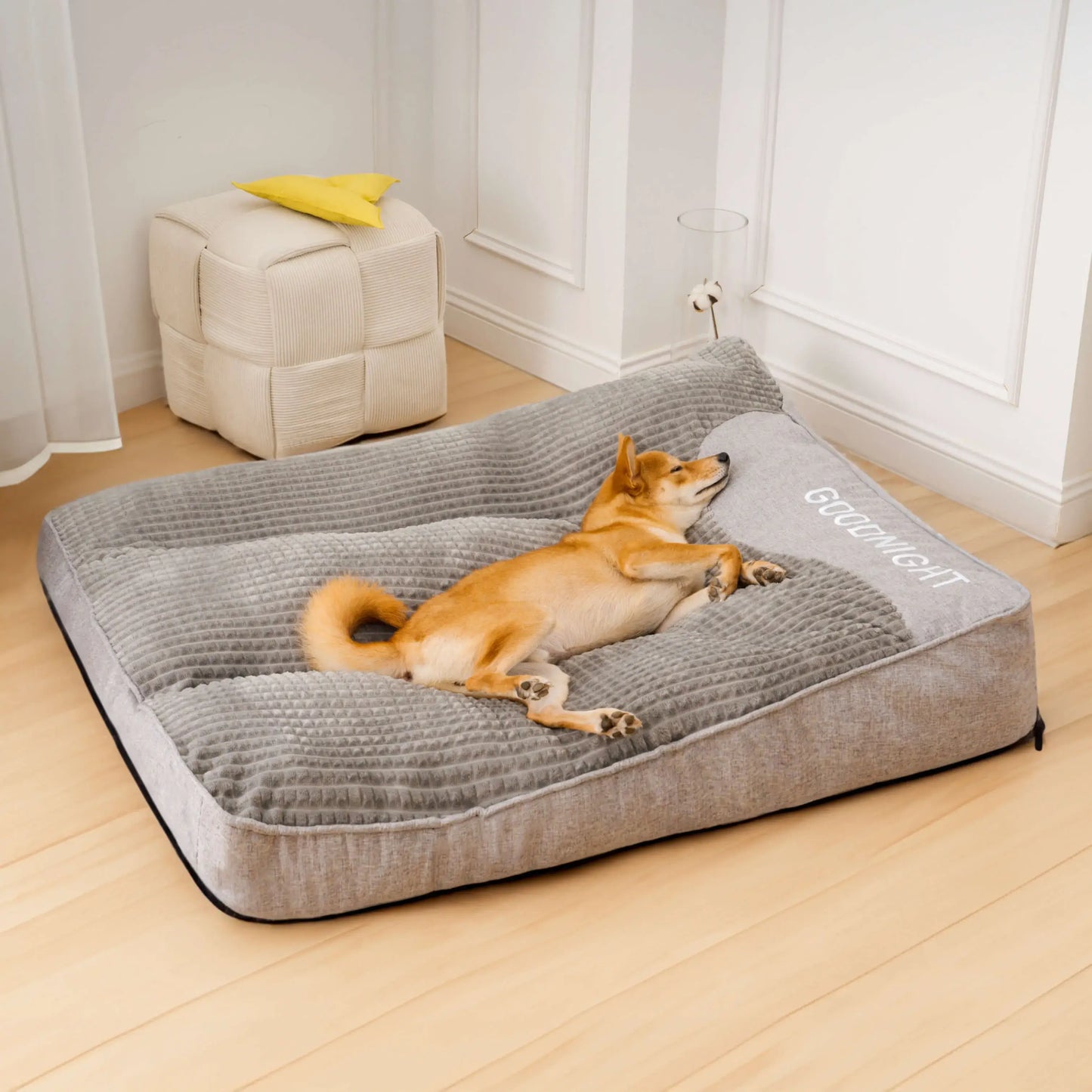 "Luxurious calming washable dog cushion in soft faux fur, available in sizes for all dogs, promotes stress-free relaxation."