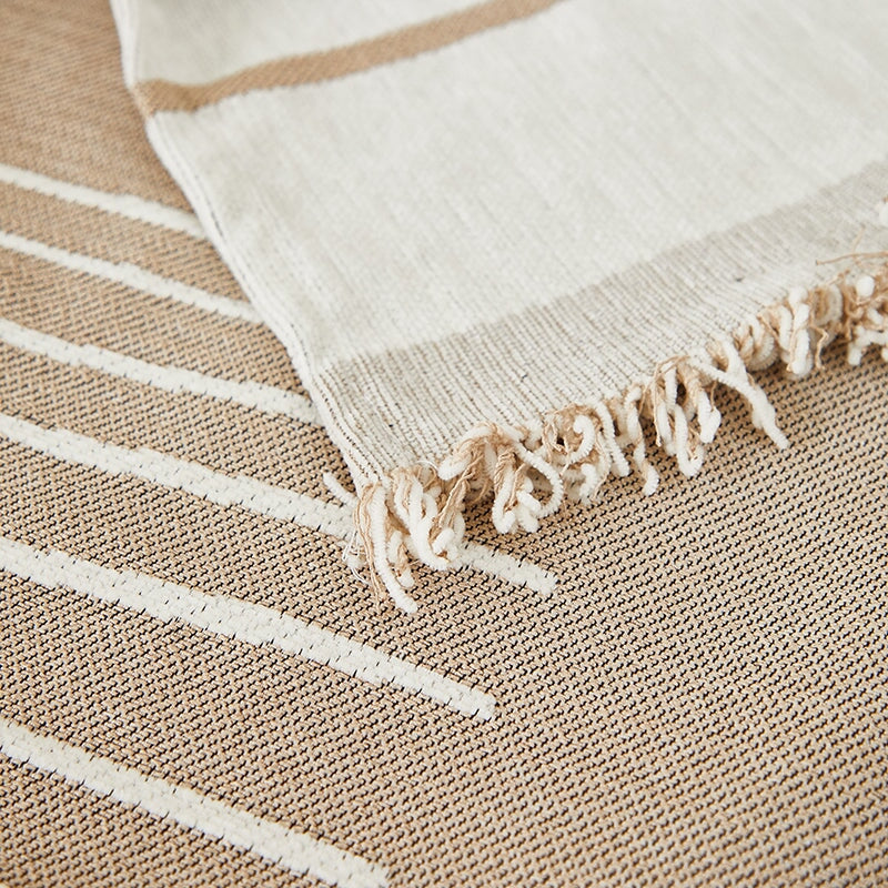 Luxurious sofa throw cover for sectionals, elegantly draped in soft, stretchable fabric, ideal for modern home decor.
