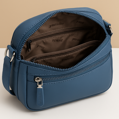 Luxury anti-theft messenger bag for women with zippered compartments and hidden pocket, perfect for travel and everyday use.