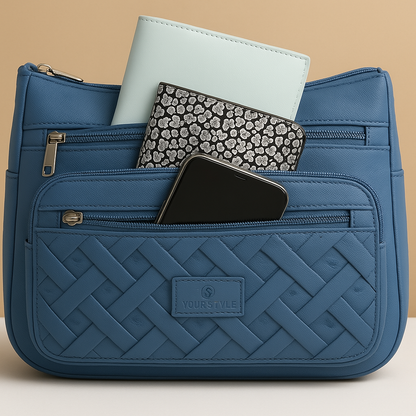 Luxury anti-theft messenger bag for women with zippered compartments and hidden pocket, perfect for travel and everyday use.