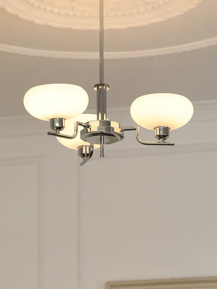 Medieval chandelier with Bauhaus style, featuring elegant details and multiple light fixtures, for home decor.
