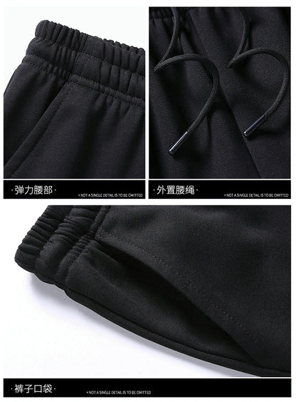 Men's athletic tracksuit set with zip-up jacket and joggers, black design, perfect for workouts and casual outings.