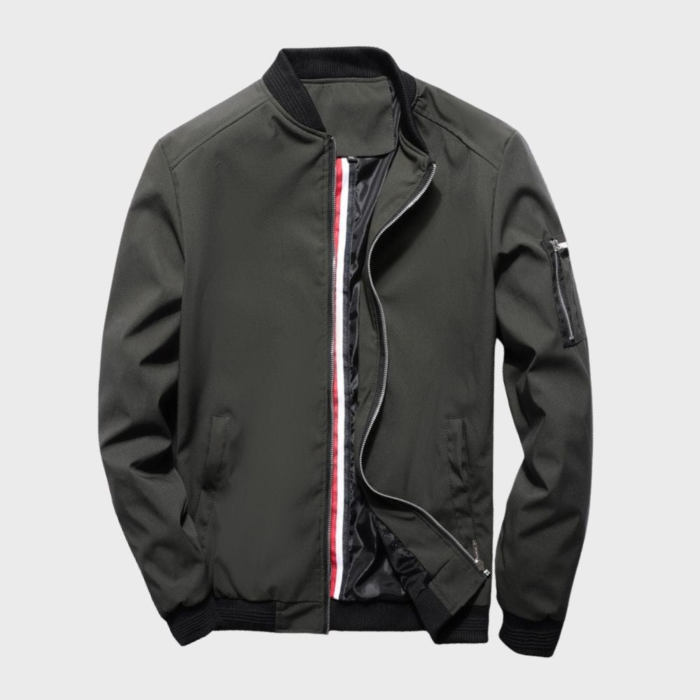 "Men's blue bomber jacket with zipper pockets, stylish fit, lightweight fabric, perfect for cool evenings."