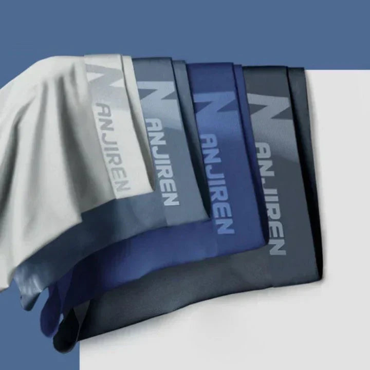 "Men's breathable boxers 4-pack, moisture-wicking, soft fabric, elastic waistband, stylish colors, comfortable fit."