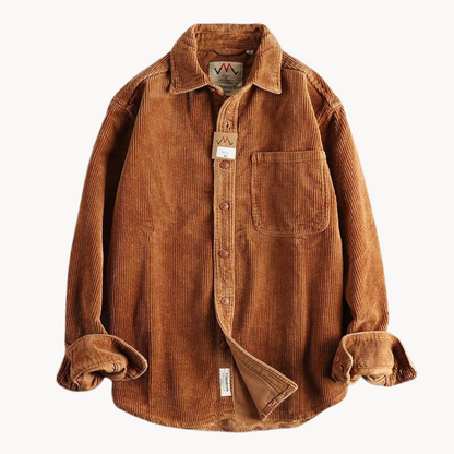 Men's classic orange corduroy shirt with button-down front and textured fabric, ideal for layering and timeless style.