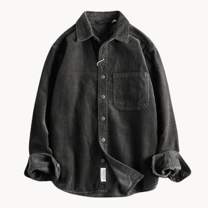 Men's classic orange corduroy shirt with button-down front and textured fabric, ideal for layering and timeless style.