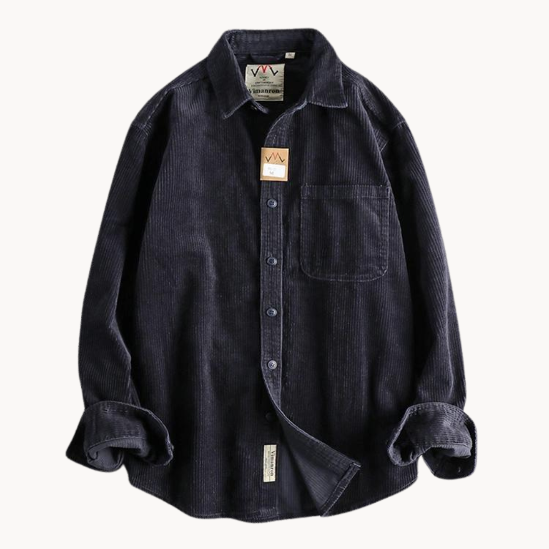 Men's classic orange corduroy shirt with button-down front and textured fabric, ideal for layering and timeless style.