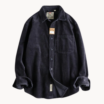 Men's classic orange corduroy shirt with button-down front and textured fabric, ideal for layering and timeless style.