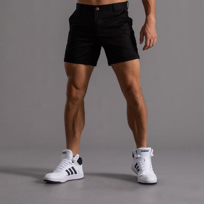 Men's cotton knee-length chino shorts in khaki, featuring a classic summer design and breathable material, ideal for casual w