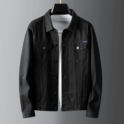 "Men's denim jacket front view with button-front closure, classic spread collar, and premium cotton fabric for style and comf