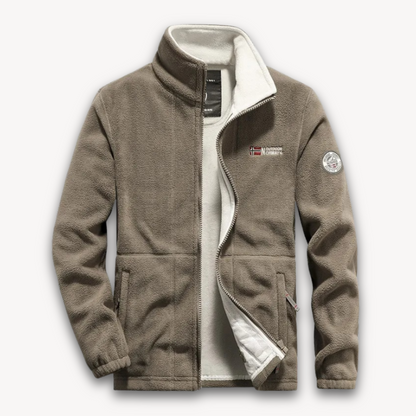 "Men's fleece jacket with full-zip front, thermal lining, in navy, side view against a white background."