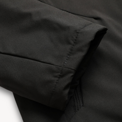 "Men's green waterproof hooded jacket for stylish and durable outerwear. Features sleek design and multi-pocket functionality