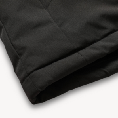 "Men's green waterproof hooded jacket for stylish and durable outerwear. Features sleek design and multi-pocket functionality