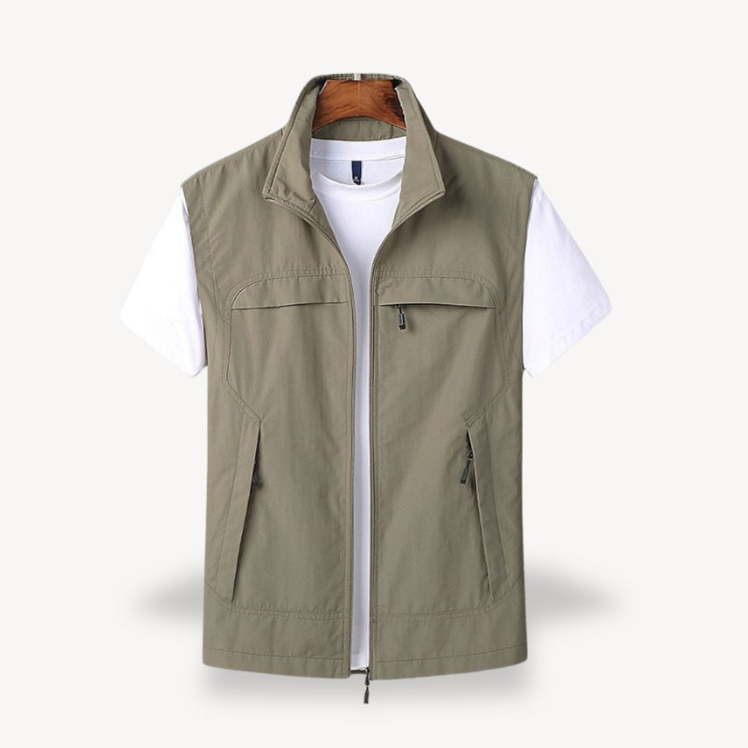 Men's lightweight quilted vest, stylish layering in navy blue, full zip, insulated yet non-bulky, perfect for cooler seasons.
