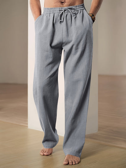 "Men's lightweight relaxed fit lounge trousers with drawstring waist, breathable fabric, shown in stylish grey tone."
